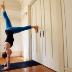 Down dog on the Wall with Leg Lift